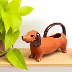 Regador original com a forma de um dachshund