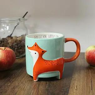 Caneca com raposa em relevo